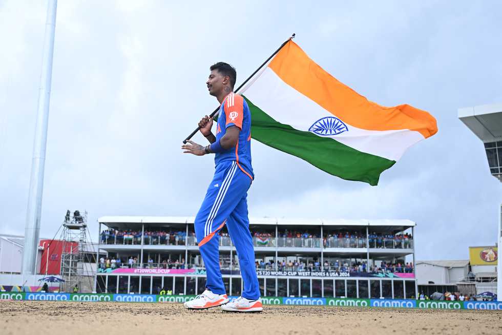 Hardik Pandya took an Indian flag with him to the middle of the pitch on which India had created history and just stood there, staring down at the surface